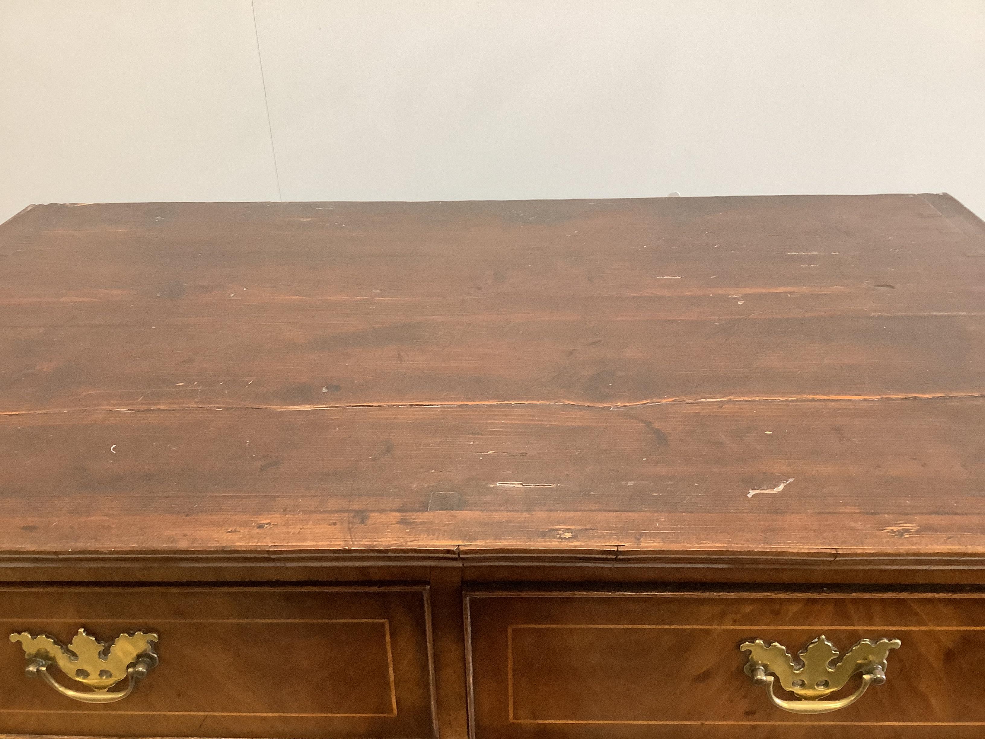 An 18th century walnut chest on stand, width 97cm, depth 56cm, height 146cm